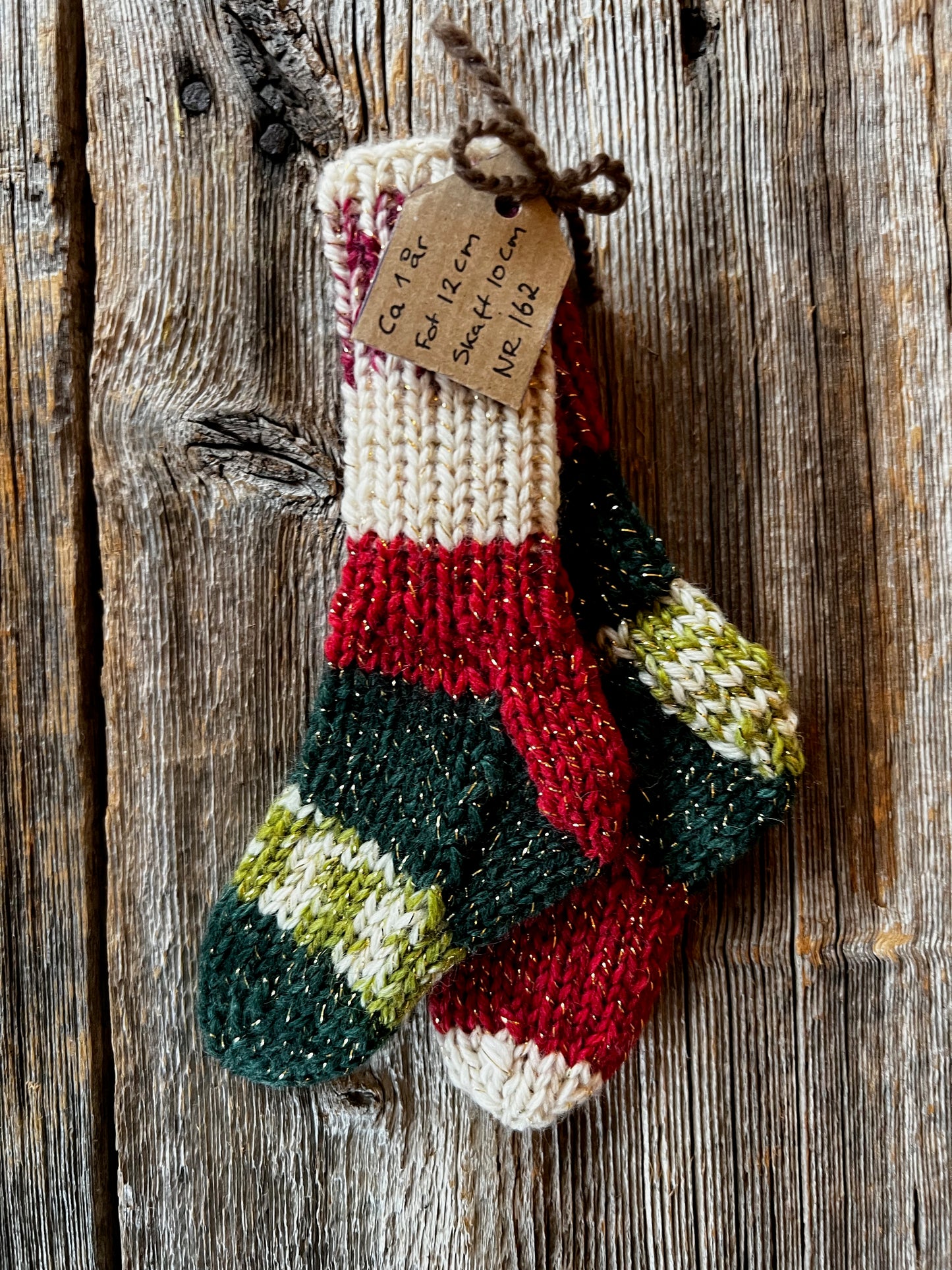 Handstickade sockor 1 år Nr 162