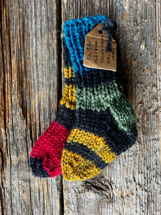 Handstickade sockor 1 år Nr 341
